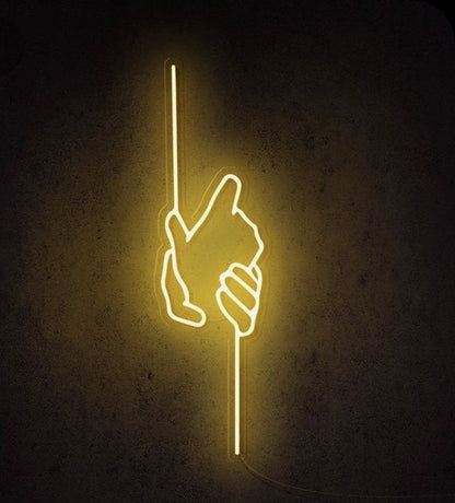Yellow Hand Neon Sign | Custom Neon Sign | Neon for Living Room Decor Neon sign of a hand holding a candle against a dark background