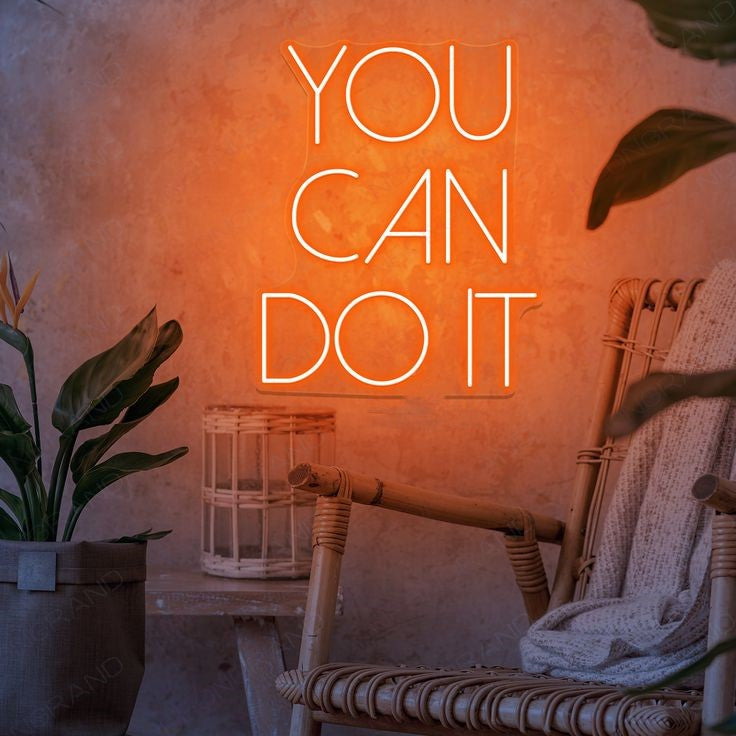 You Can Do It Neon Sign | Custom Neon Sign | Neon for Gym Decor Neon sign with 'You Can Do It' in a cozy room with a chair and plant.