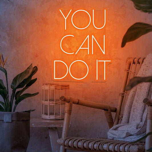 You Can Do It Neon Sign | Custom Neon Sign | Neon for Gym Decor Neon sign with 'You Can Do It' in a cozy room with a chair and plant.