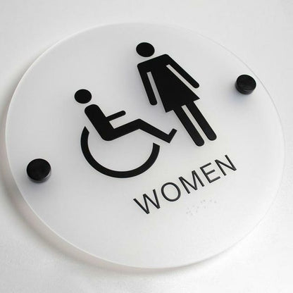 Accessible women restroom sign with wheelchair symbol
