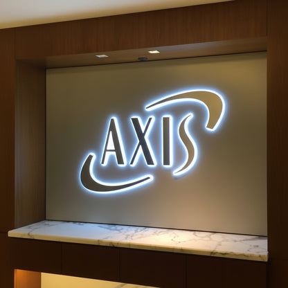 Axis backlit LED logo sign halo lit 3D wall signage office reception interior