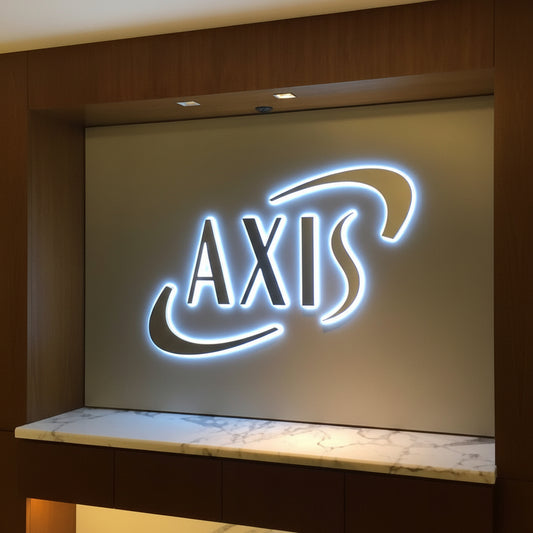 Axis backlit LED logo sign halo lit 3D wall signage office reception interior