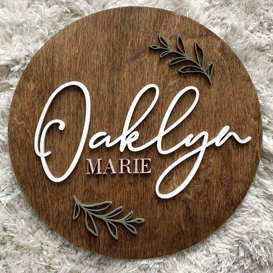 Personalised Round Wooden Name Plaque with Elegant Script Lettering and Botanical Details