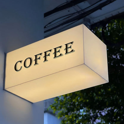 Custom coffee shop LED light box sign for illuminated cafe storefront branding.