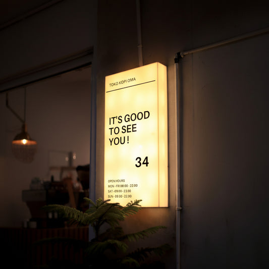 Custom vertical LED cafe light box sign for illuminated coffee shop branding.