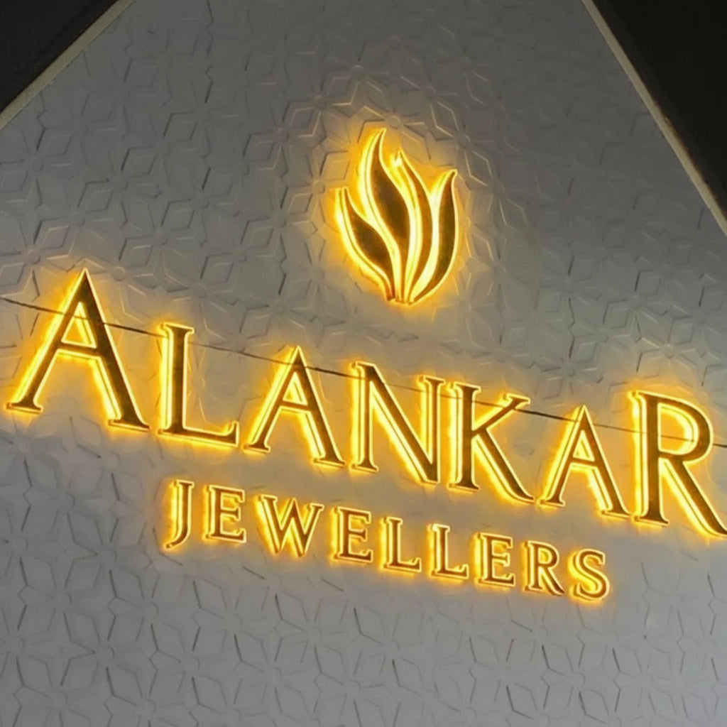 gold backlit metal letter signage with halo lighting for luxury building exterior display