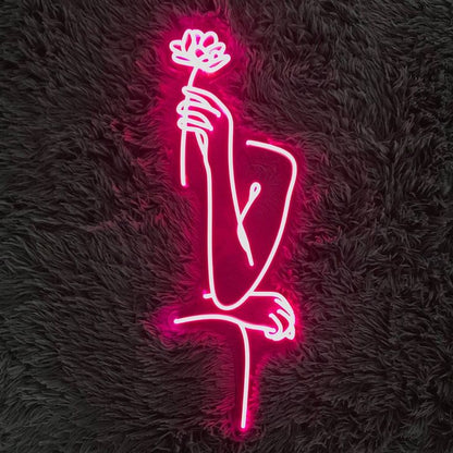 Hand holding flower neon sign board pink LED neon light wall decor
