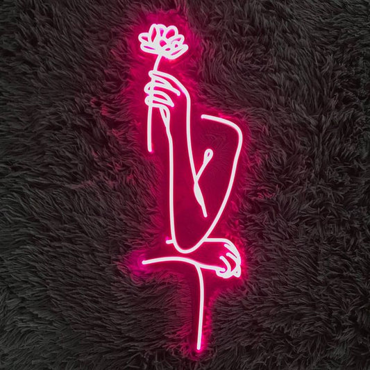 Hand holding flower neon sign board pink LED neon light wall decor