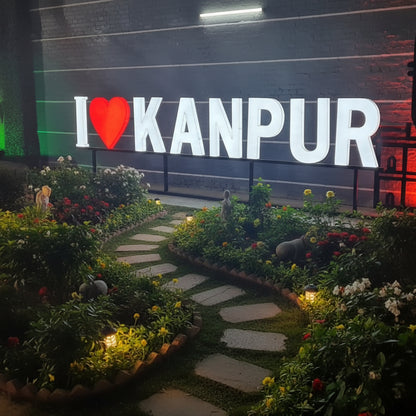 illuminated Kandivali city LED signboard with red heart decorative green wall display