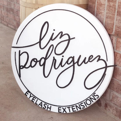 Liz Rodriguez eyelash extensions round acrylic sign 3D salon logo board beauty studio signage