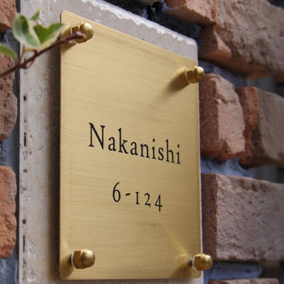 luxury brass acrylic house name plate modern door sign mounted on brick wall