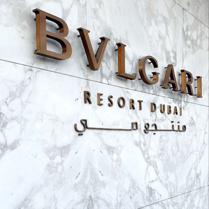 luxury metal 3D gold letter sign hotel resort wall logo signage marble background