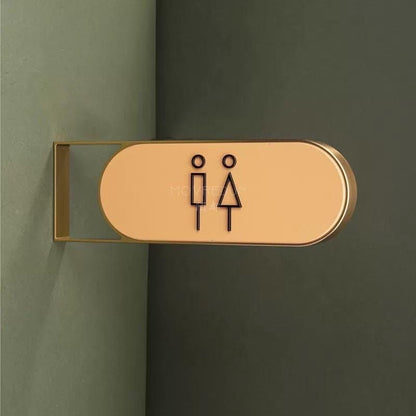 Luxury oval projecting restroom sign with men and women icons
