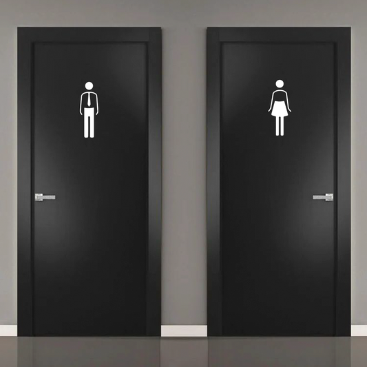 Male female restroom door icons signage on black doors for washroom identification

