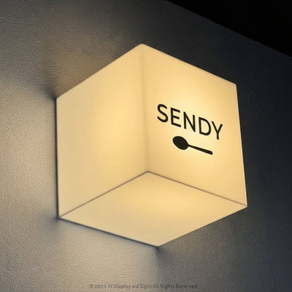 Minimalist cube LED light box sign for modern wall mounted business branding.