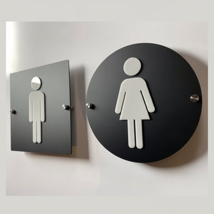 Modern black restroom sign set with round and square male female icons
