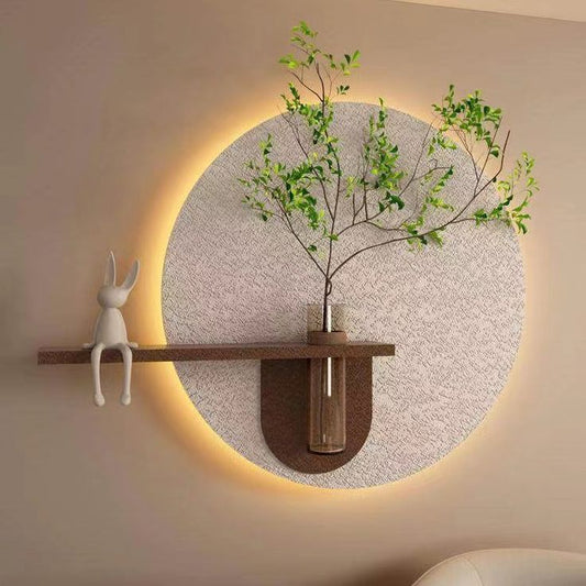 modern LED round wall decor with wooden shelf and plant vase
