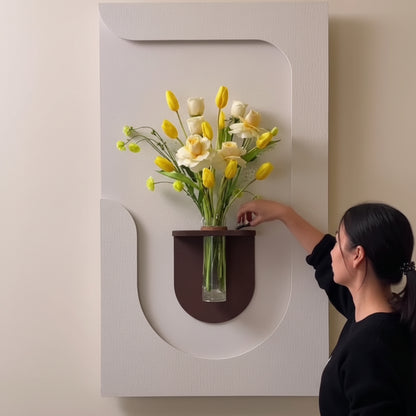 modern curved wall panel with shelf and glass vase yellow flowers decor
