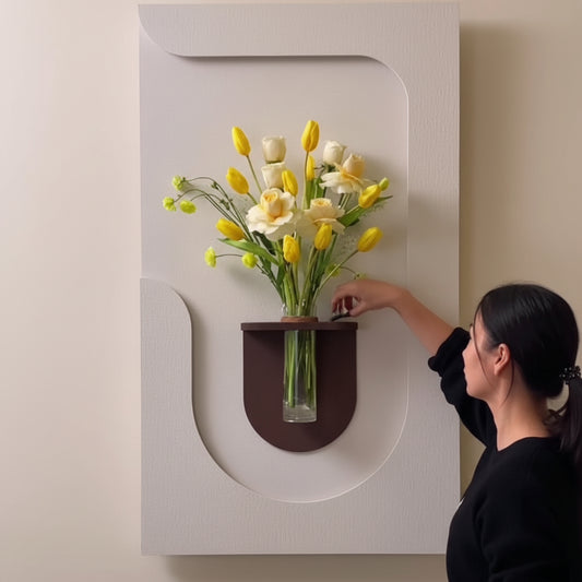 modern curved wall panel with shelf and glass vase yellow flowers decor
