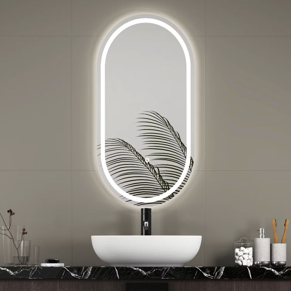 modern oval LED bathroom mirror with warm backlight vertical capsule mirror above sink