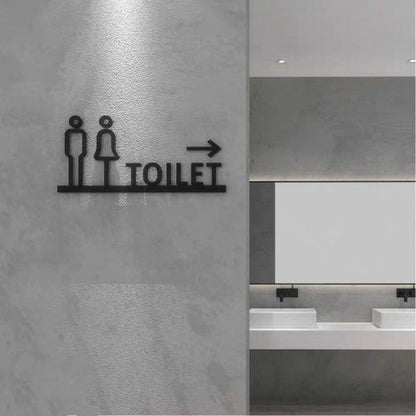 Modern toilet direction sign with male female icons and right arrow
