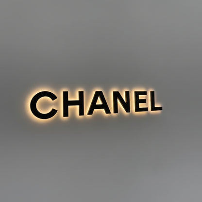 premium illuminated wall logo sign halo lighting modern retail branding signage
