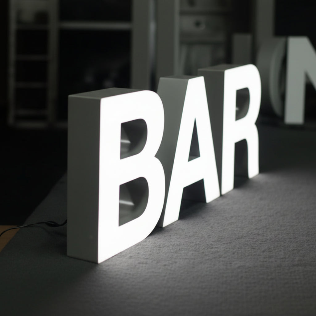 premium white illuminated channel letters hanging sign retail store branding modern interior