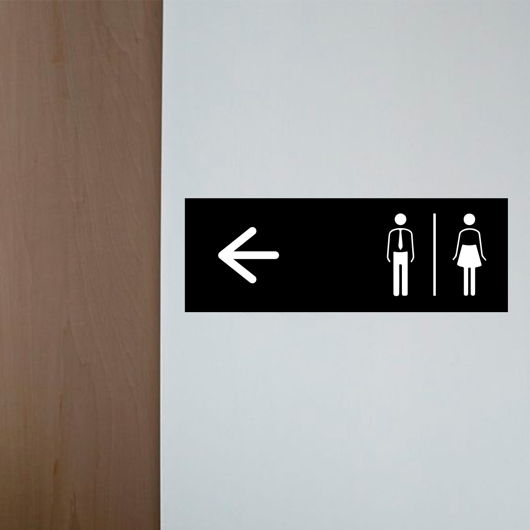 Restroom directional sign with arrow and male female icons for wayfinding
