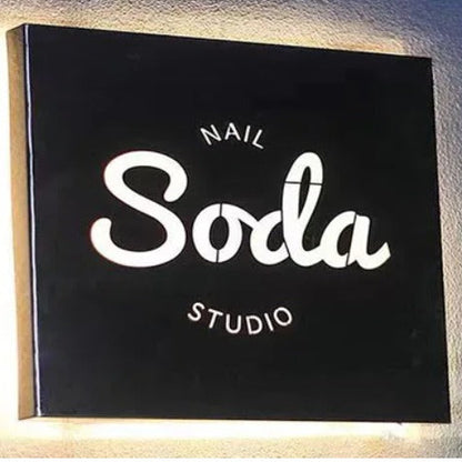 round black acrylic LED backlit restaurant sign with halo lighting for cafe and bar branding