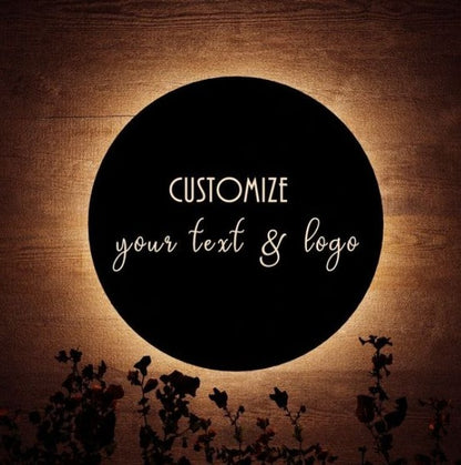 round black acrylic LED halo logo sign with illuminated text for office and premium business decor