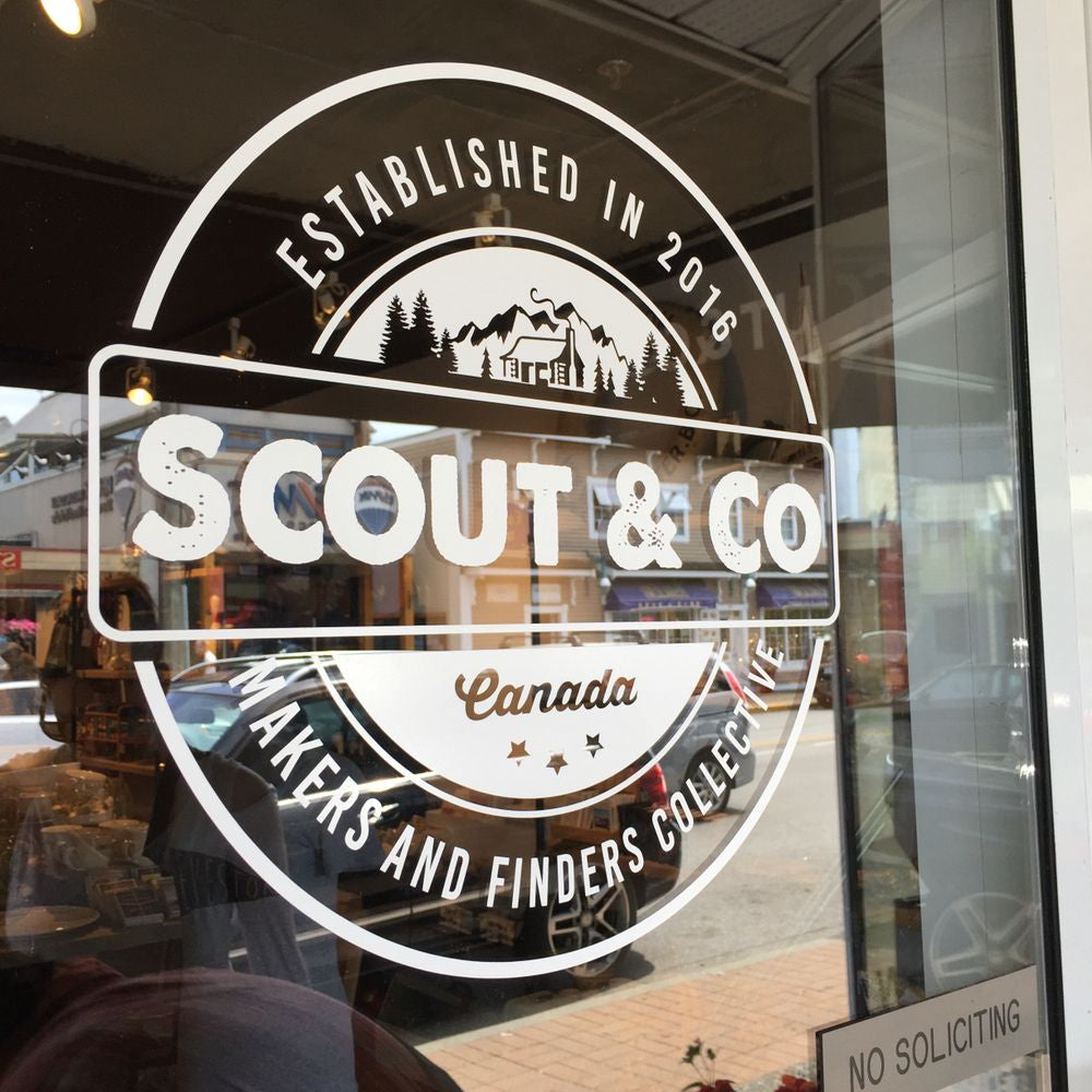 Scout and Co custom vinyl glass branding sticker for storefront window logo display
