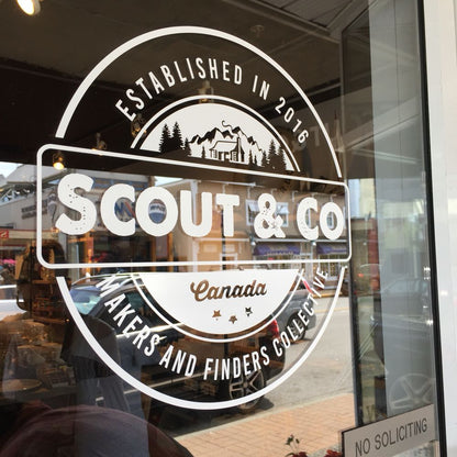 Scout and Co custom vinyl glass branding sticker for storefront window logo display